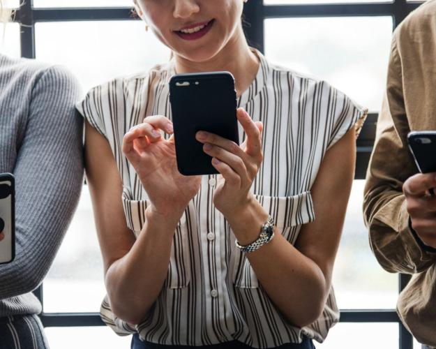 People holding cell phones