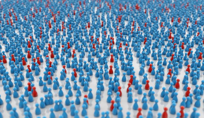 Blue and red chess pieces on white background signifying public health